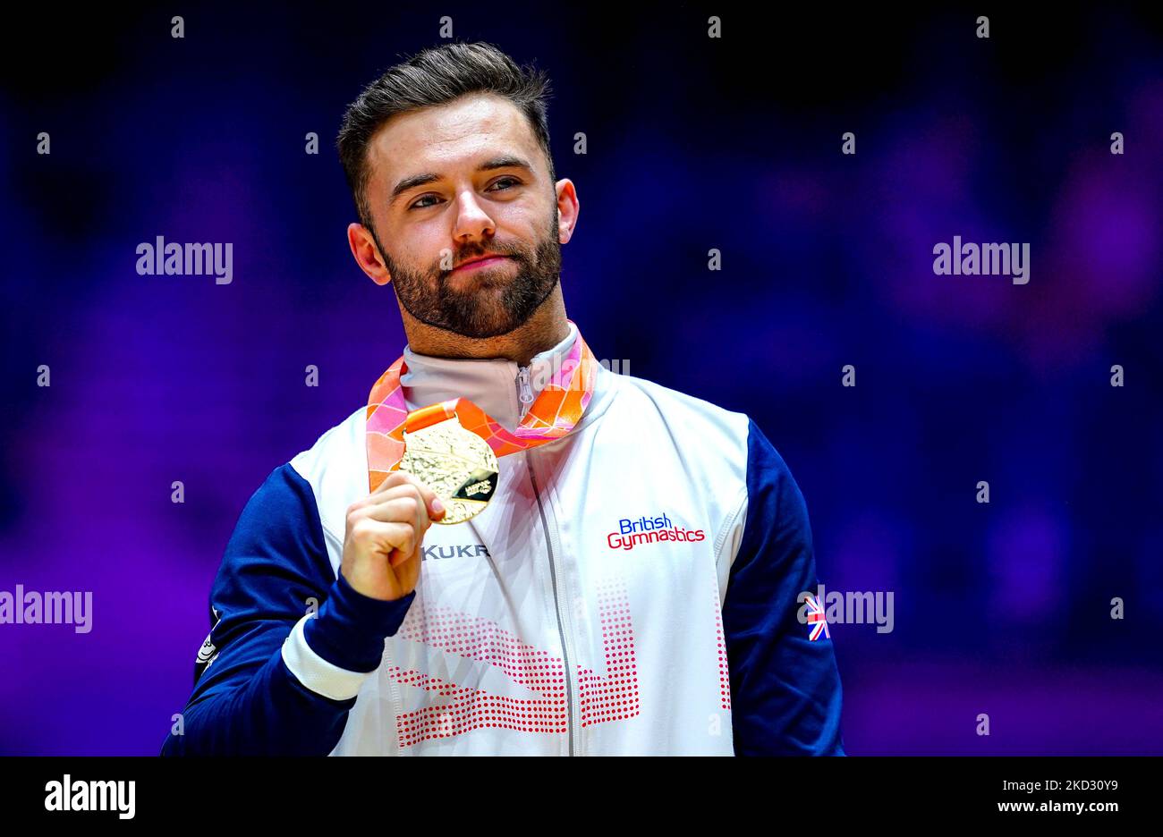 Great Britain's Giarnni ReginiMoran celebrates with his gold medal