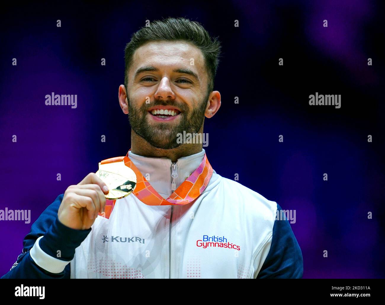 Great Britain's Giarnni ReginiMoran celebrates with his gold medal