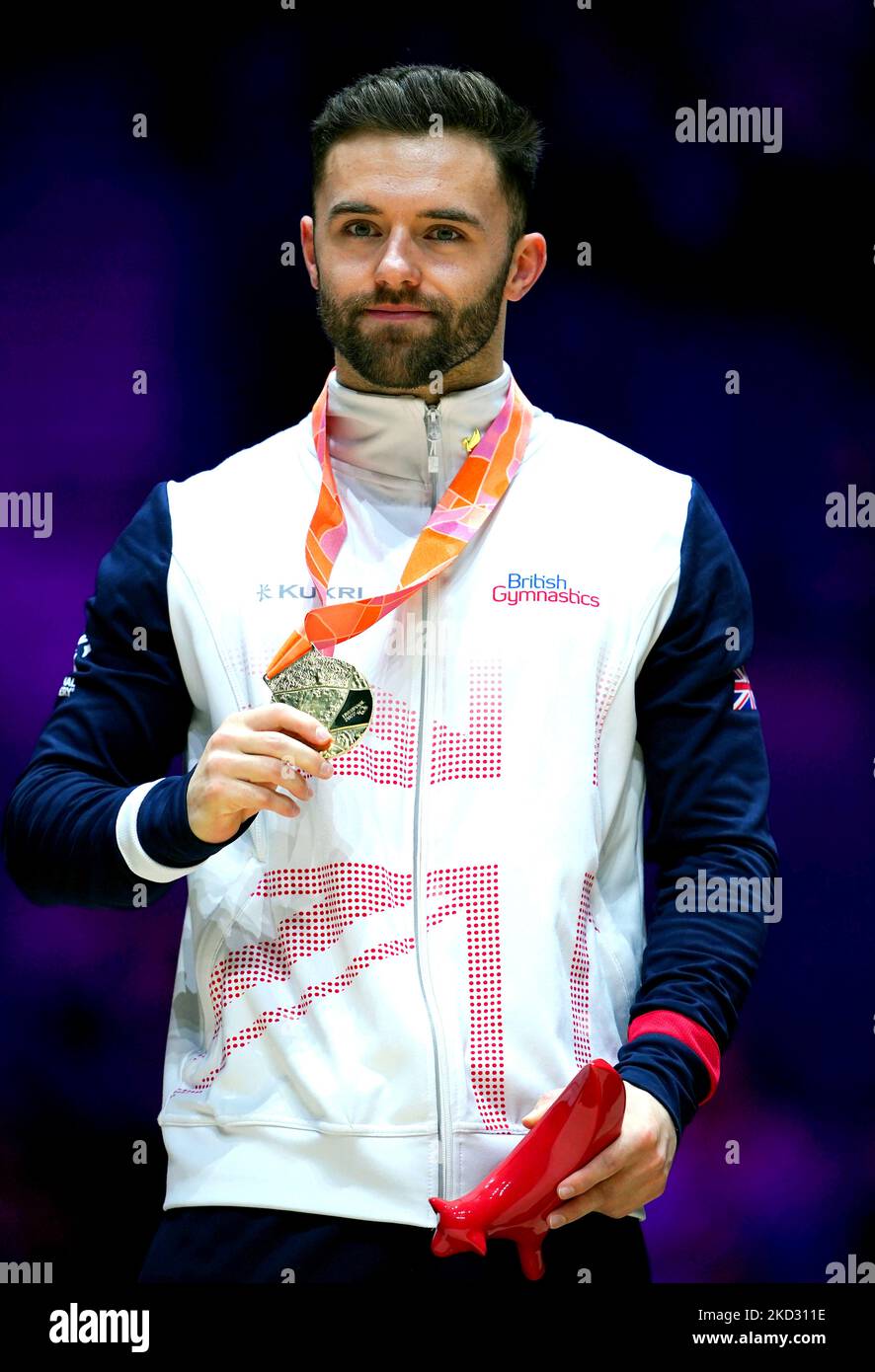 Great Britain's Giarnni ReginiMoran celebrates with his gold medal