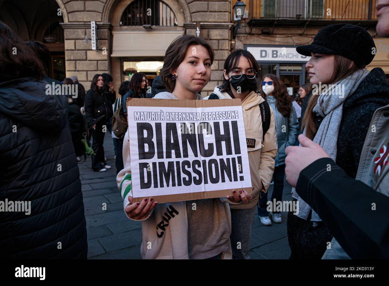A student holding a sign addressing minister Bianchi to resign during a student protest in Pisa, Italy, on February 18, 2022. Demonstrations happened all across Italy to contest the school-work internship project where the 18-year-old Lorenzo Parelli died in an accident in January in the province of Udine and Giuseppe Lenoci died in a car accident on Monday 14th February in Fermo's province. (Photo by Enrico Mattia Del Punta/NurPhoto) Stock Photo