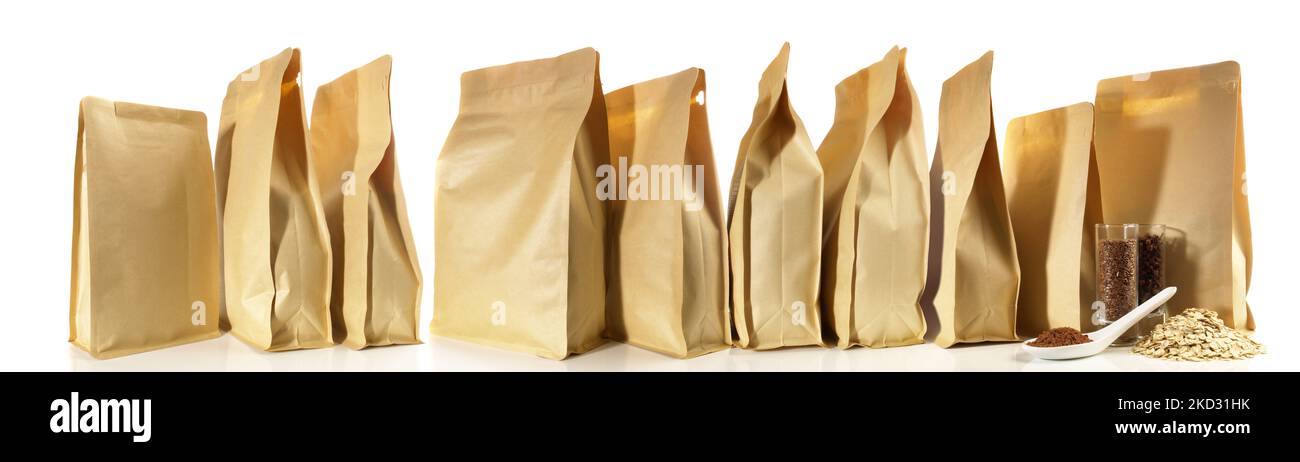 Different size paper bags isolated on white Background. Banner with foods and nutrients. Stock Photo