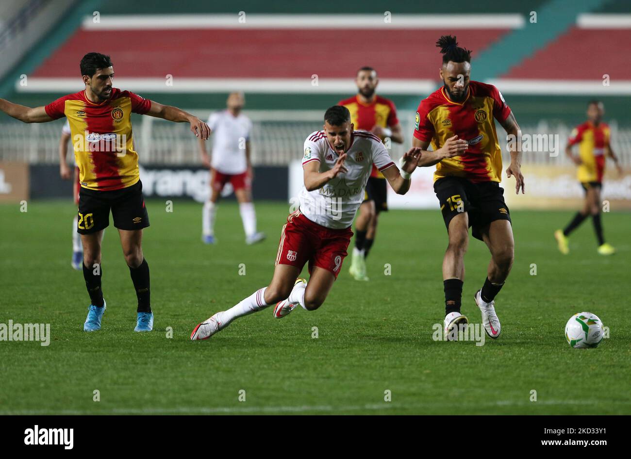 Karim Aribi of CR Belouizdad (C) fights for the ball during the CAF Champions League soccer match between CR Belouizdad and Esperance Tunis at the 5th of July stadium in Algiers, Algeria on February 19, 2022 (Photo by Billel Bensalem/APP/NurPhoto) Stock Photo