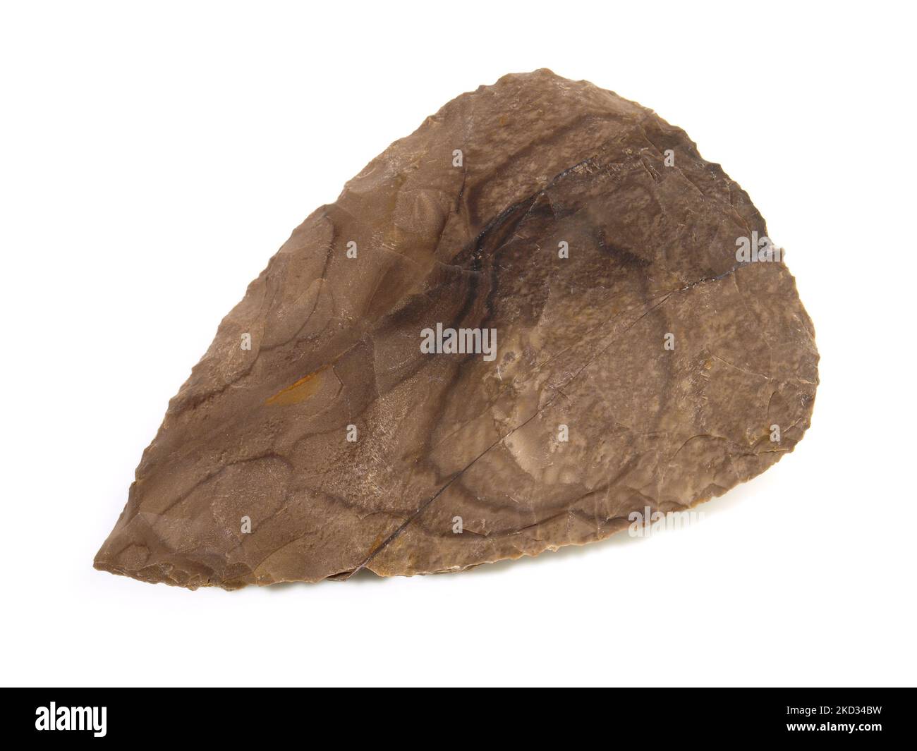 Stone Age Hand Axe out of Flintstone on white Background Stock Photo