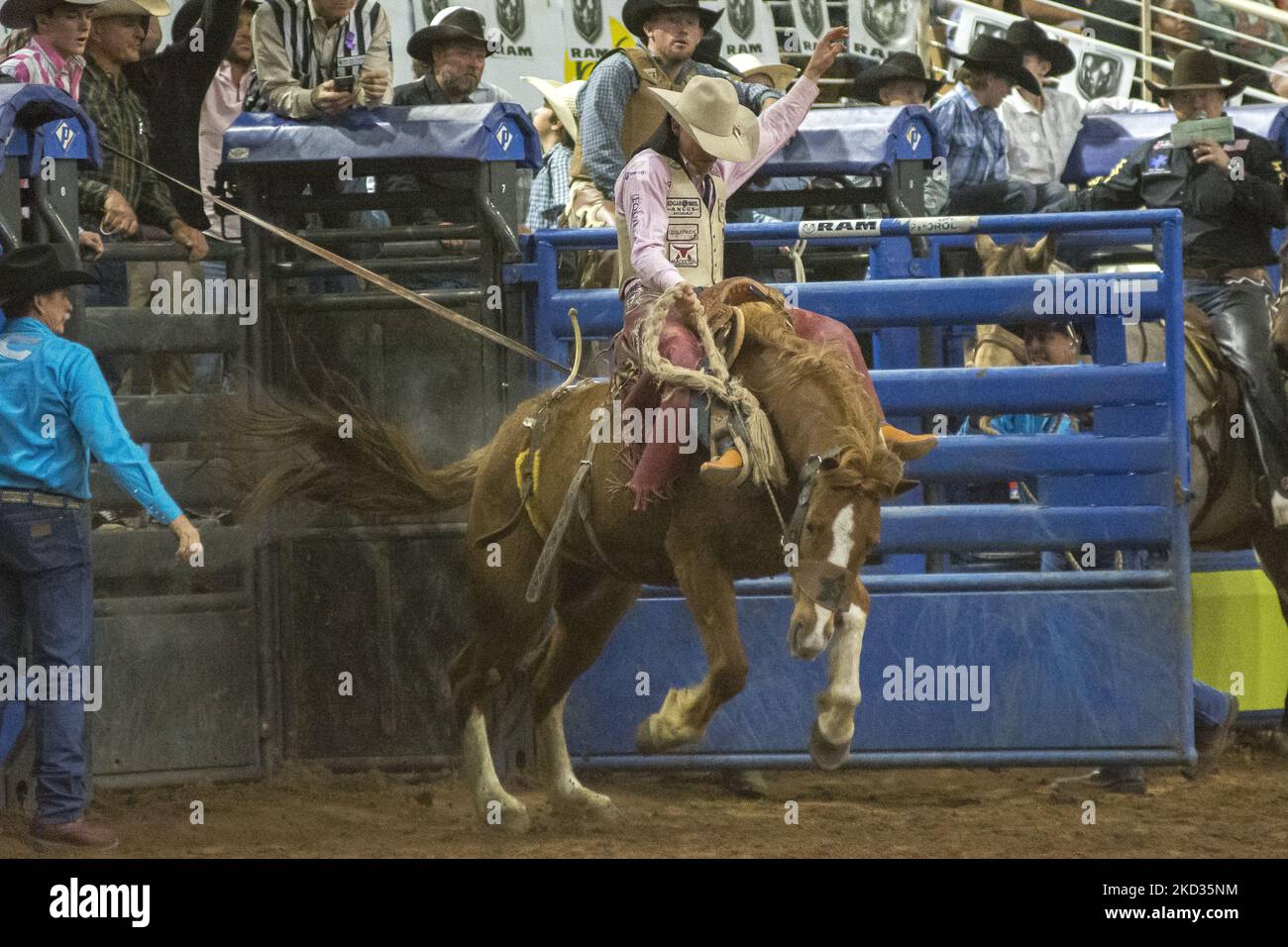 Cole Elshere of Faith, South Dakota, USA rides in the saddle bronc