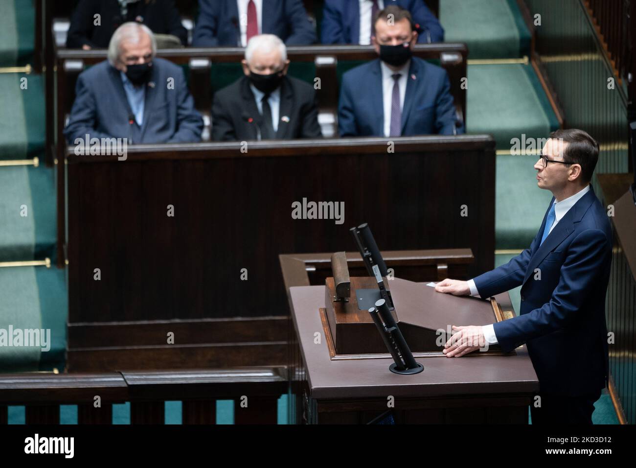 Leader of the Polish Law and Justice (PiS) ruling party Jaroslaw Kaczynski (C), Polish Deputy Sejm Speaker Ryszard Terlecki (L) and Polish Defense Minister Mariusz Blaszczak (R), Prime Minister Mateusz Morawiecki (Front), during the 49th session of the Sejm (lower house) in Warsaw, Poland, on 24 February 2022. Polish Parliament has passed a resolution condemning Russian aggression against Ukraine and calling on the international community to impose tough sanctions on Moscow. (Photo by Mateusz Wlodarczyk/NurPhoto) Stock Photo