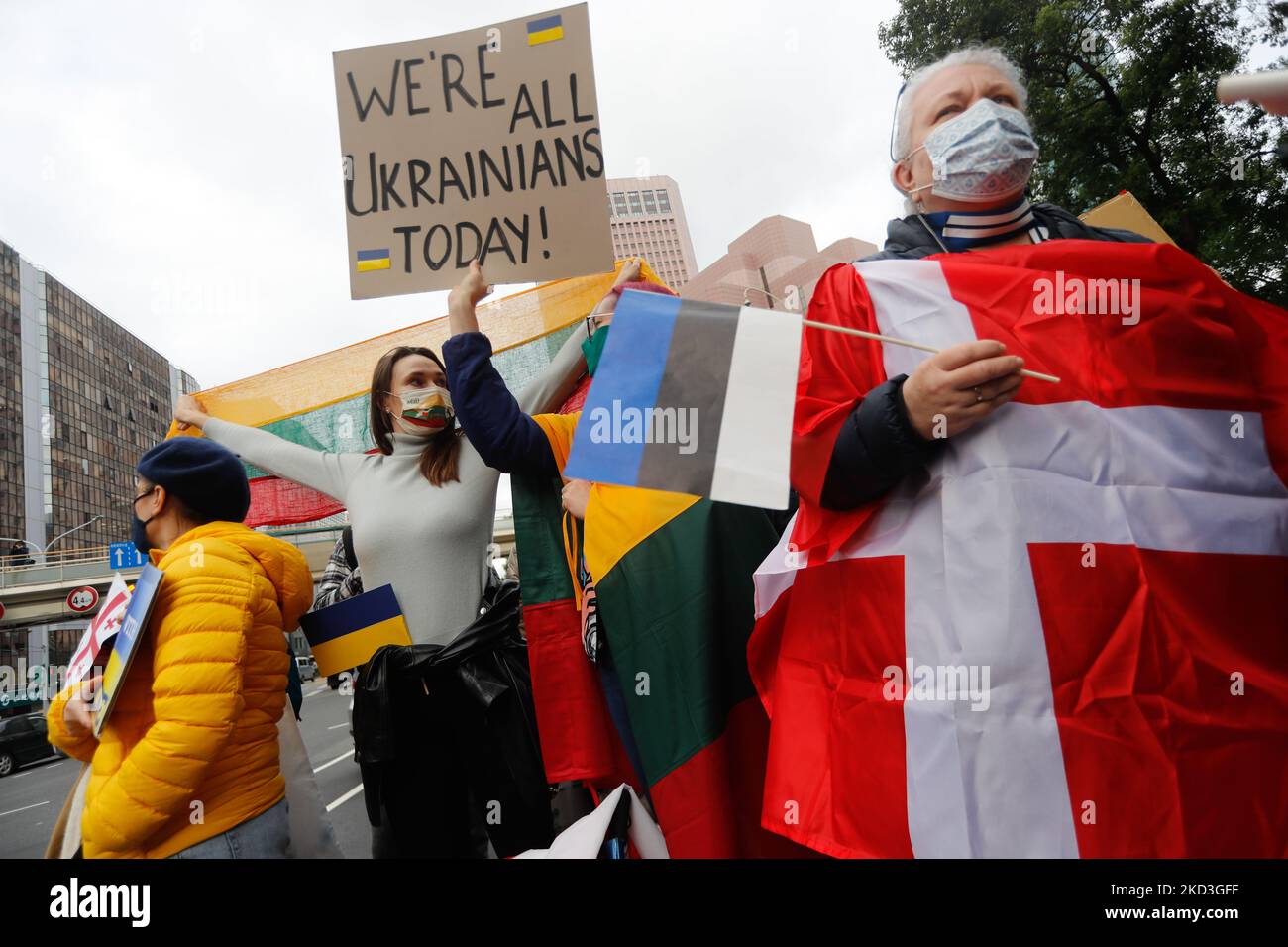 Demonstrators holding placards that read ‘We are all Ukrainians today’, and national flags of Ukraine, Denmark, Estonia and Lithuania, during a protest against Russian live-fire attacks on Ukraine, outside the Moscow-Taipei Coordination Commission in Taiwan, in Taipei, Taiwan, 25 February 2022. Several western countries including the US and UK have imposed sanctions on Russia, with Baltic states members including Lithuania and Estonia showing support of Ukraine. (Photo by Ceng Shou Yi/NurPhoto) Stock Photo