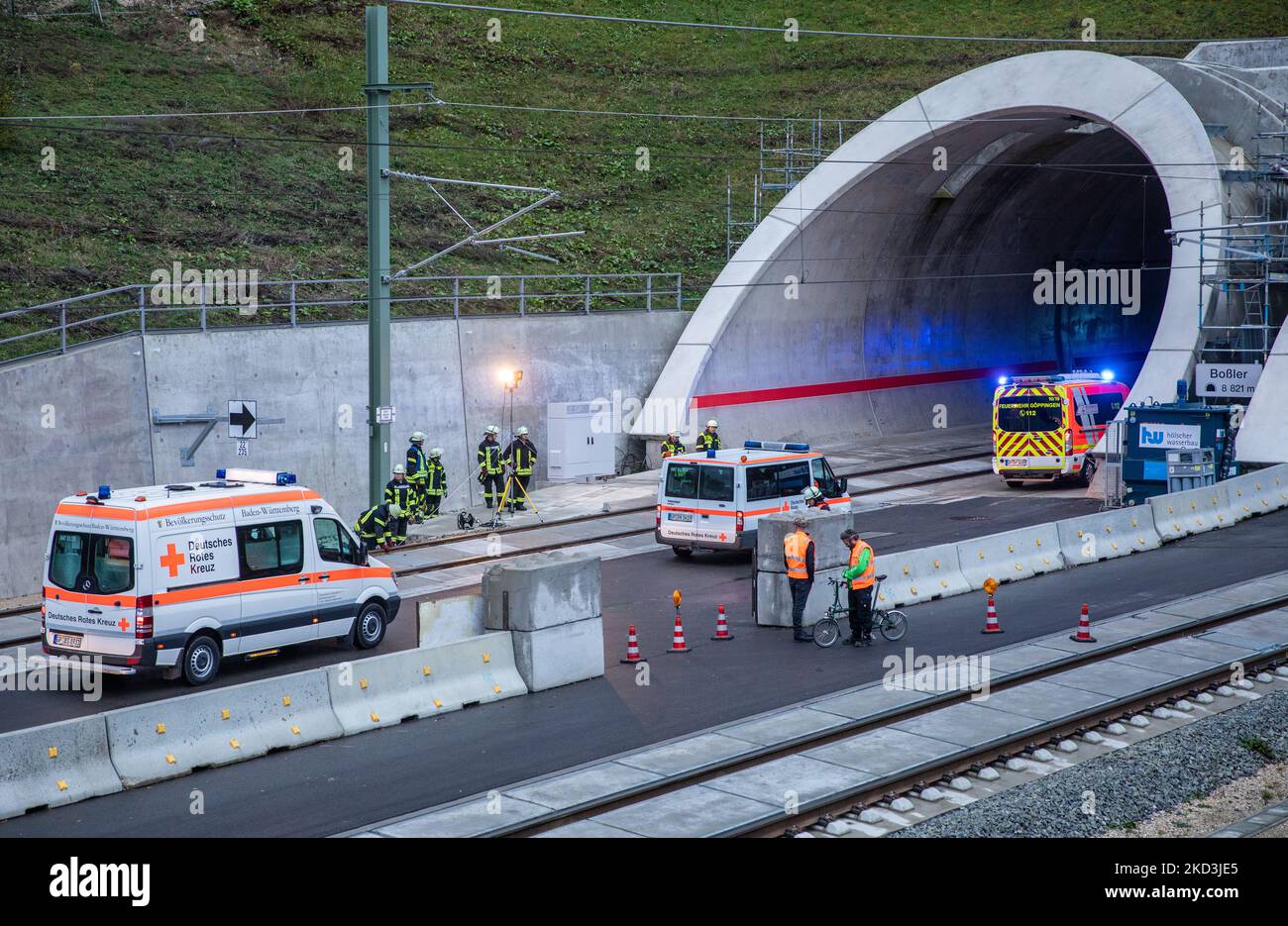 Aichelberg, Germany. 05th Nov, 2022. Emergency services drive into the Boßler Tunnel with rescue vehicles during a large-scale emergency exercise. The tunnel is located on the new Wendlingen-Ulm high-speed rail line, which will go into operation in December 2022. Credit: Christoph Schmidt/dpa/Alamy Live News Stock Photo