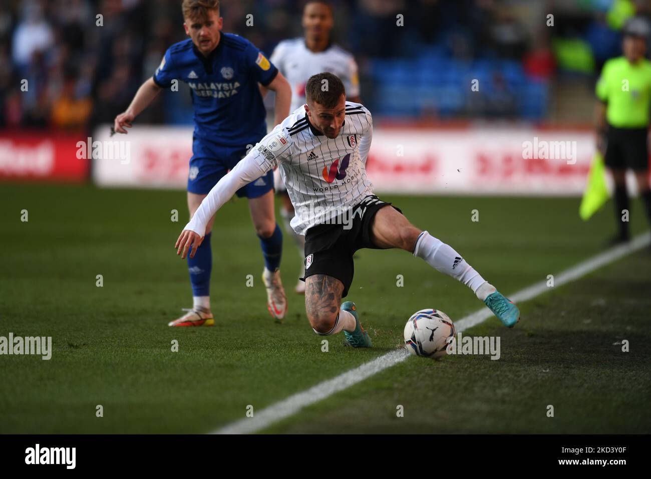Joe Bryan of Fulham battles to keep the ball in play during the Sky Bet Championship match between Cardiff City and Fulham at the Cardiff City Stadium, Cardiff on Saturday 26th February 2022. (Photo by Jeff Thomas/MI News/NurPhoto) Stock Photo