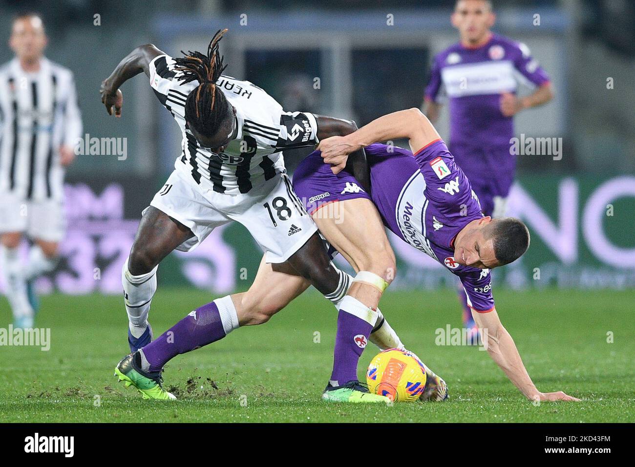 Florence, Italy. 21st May, 2022. Moise Kean of Juventus FC and Nikola  Milenkovic of ACF Fiorentina compete for the ball during the Serie A  2021/2022 football match between ACF Fiorentina and Juventus