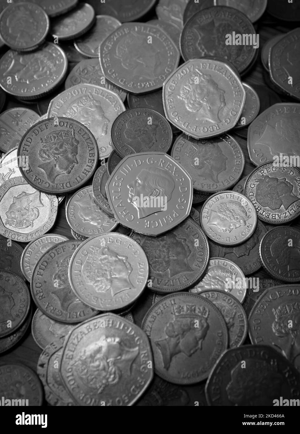Loose change including the new Fifty pence piece featuring King Charles III portrait Stock Photo