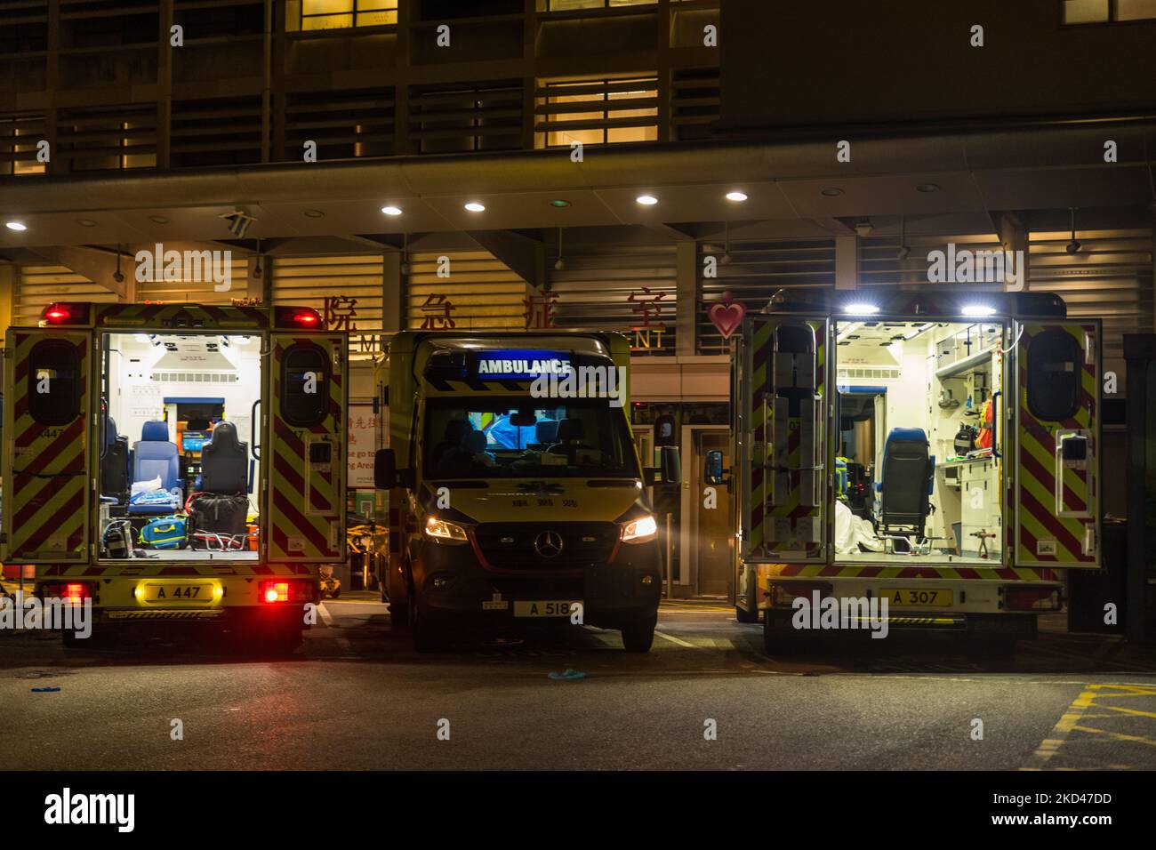 Three ambulances are awaiting their crew at Queen Elisabeth hospital in Kowloon, in Hong Kong, China, on March 04, 2022. (Photo by Marc Fernandes/NurPhoto) Stock Photo