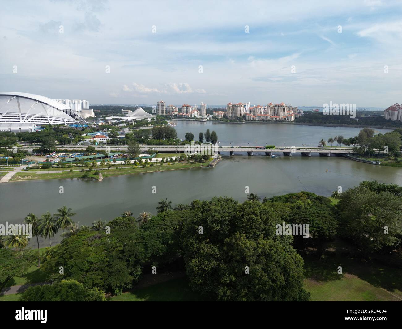 A High-angle Of Kallang River View With A National Stadium, Cloudy Sky 