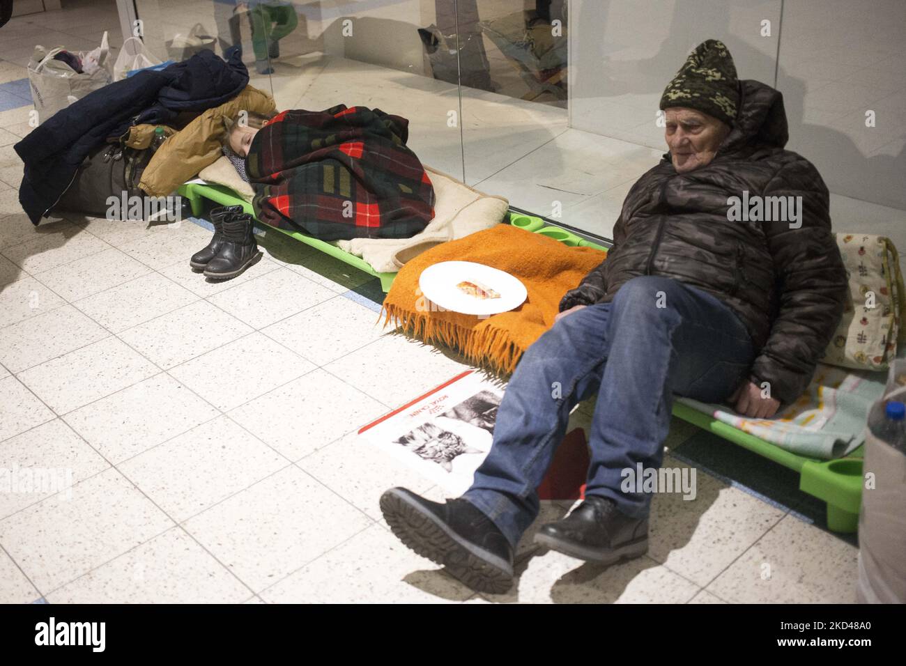 Refugees seen in abandoned supermarket in Przemysl and Medyka on March 4, 2022. (Photo by Maciej Luczniewski/NurPhoto) Stock Photo