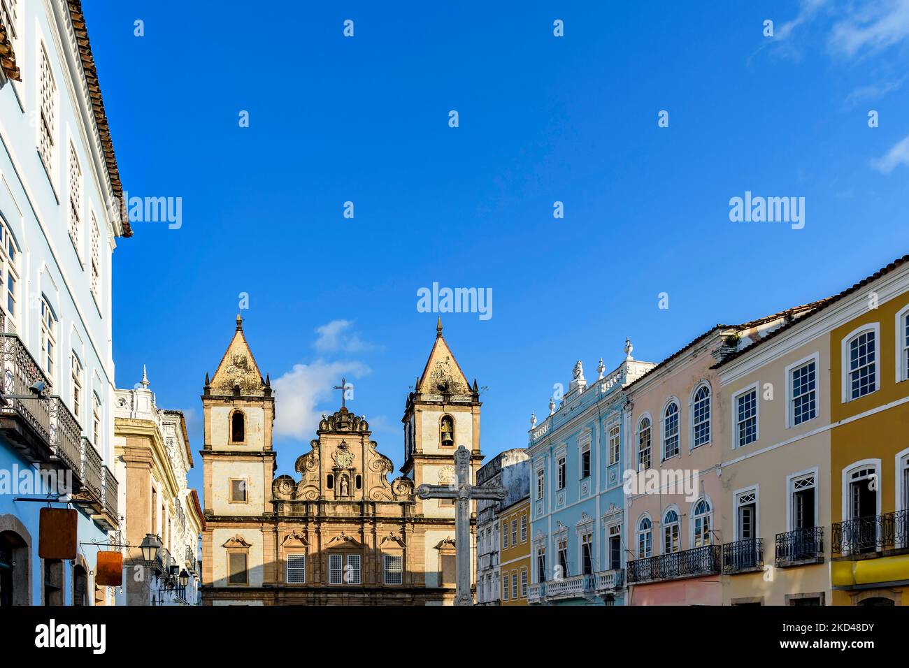 Facades of old and historic church and houses in colonial and baroque style in the tourist center of Pelourinho, city of Salvador, Bahia Stock Photo