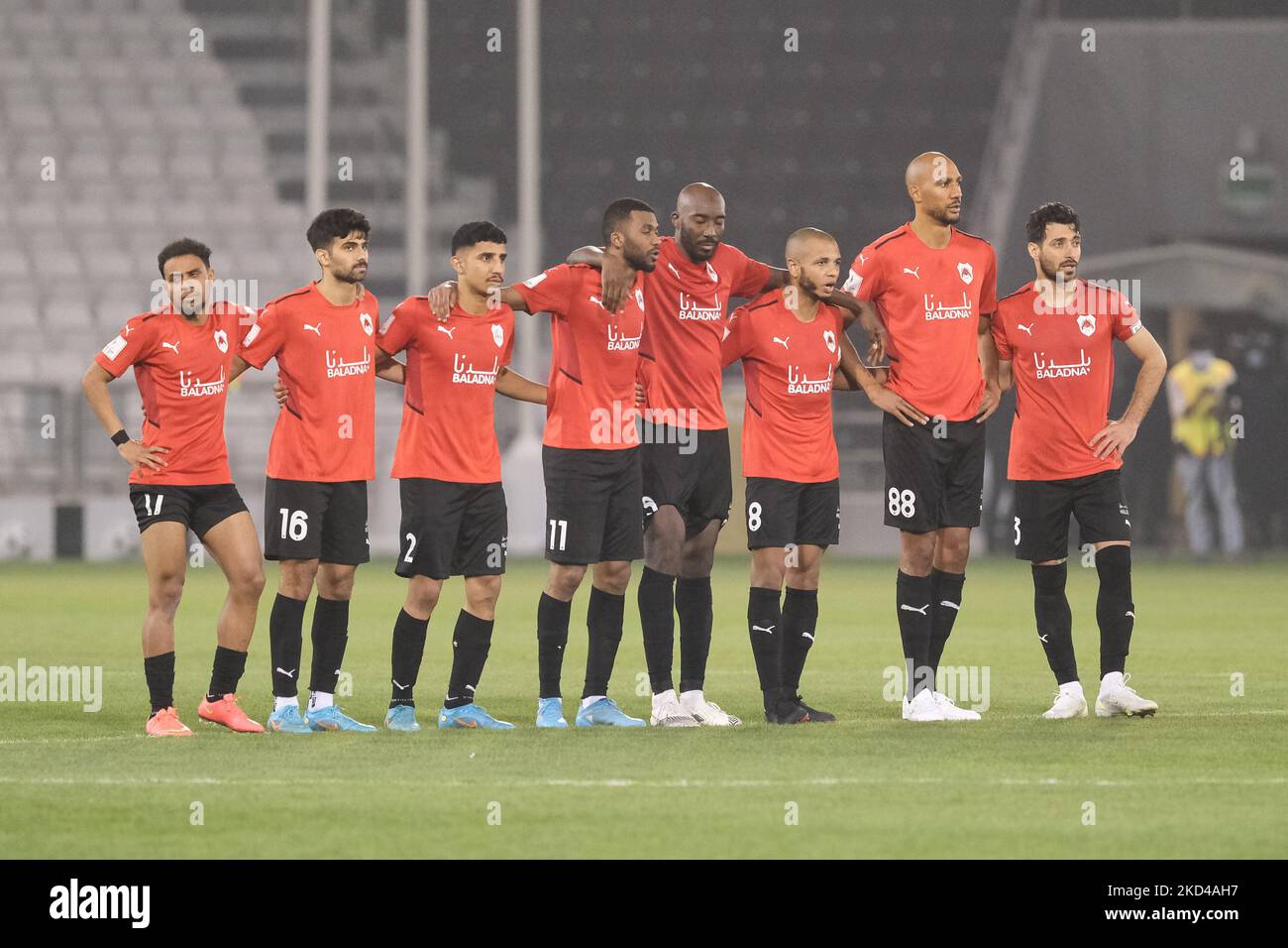 The Al Rayyan team watch the penalty shootout of the Amir Cup quarter