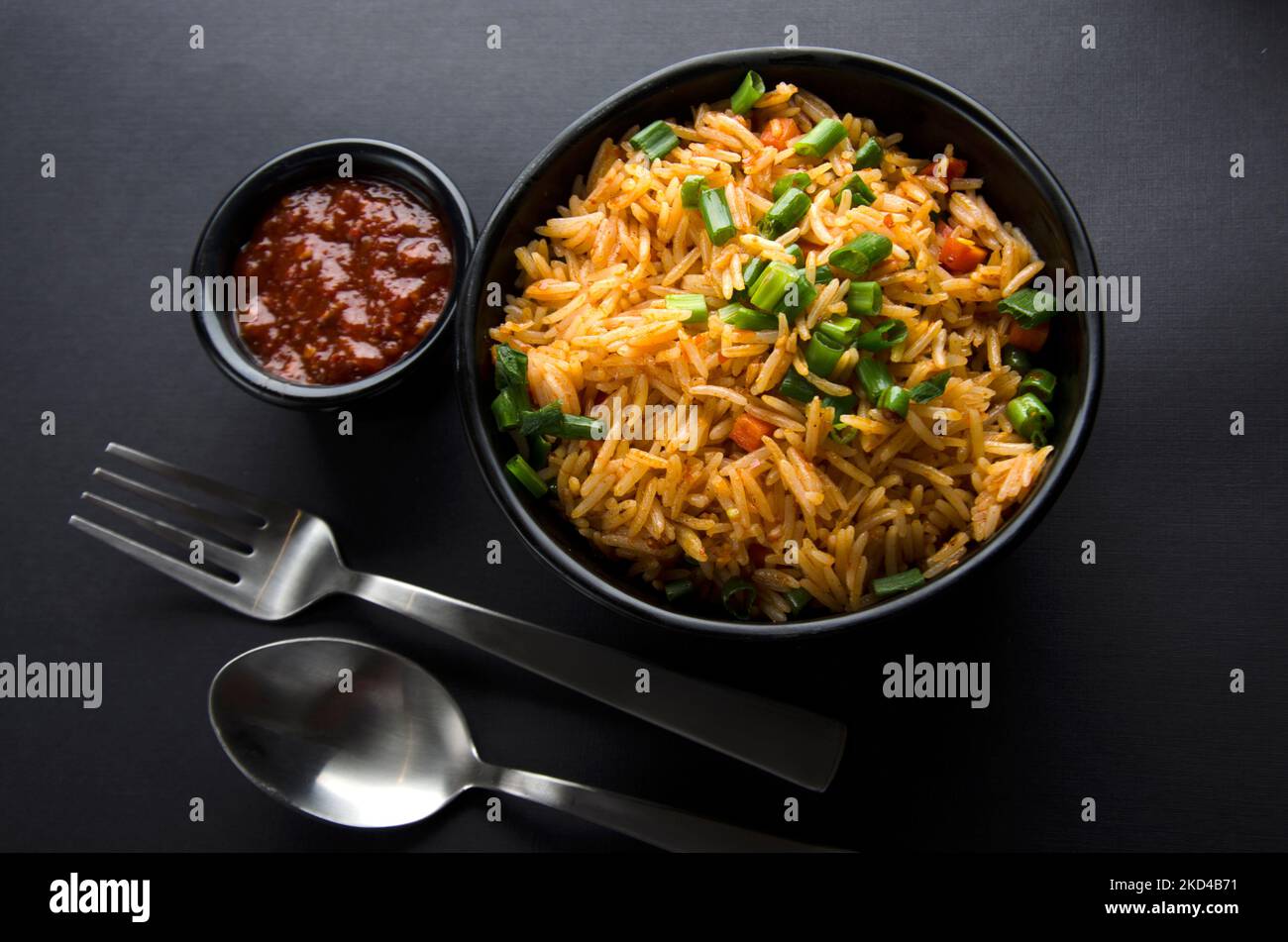 close up of Chinese style shrimp Schezwan noodles, vegetable Hakka Noodles or chow mein is a popular Indo-Chinese recipes. Stock Photo