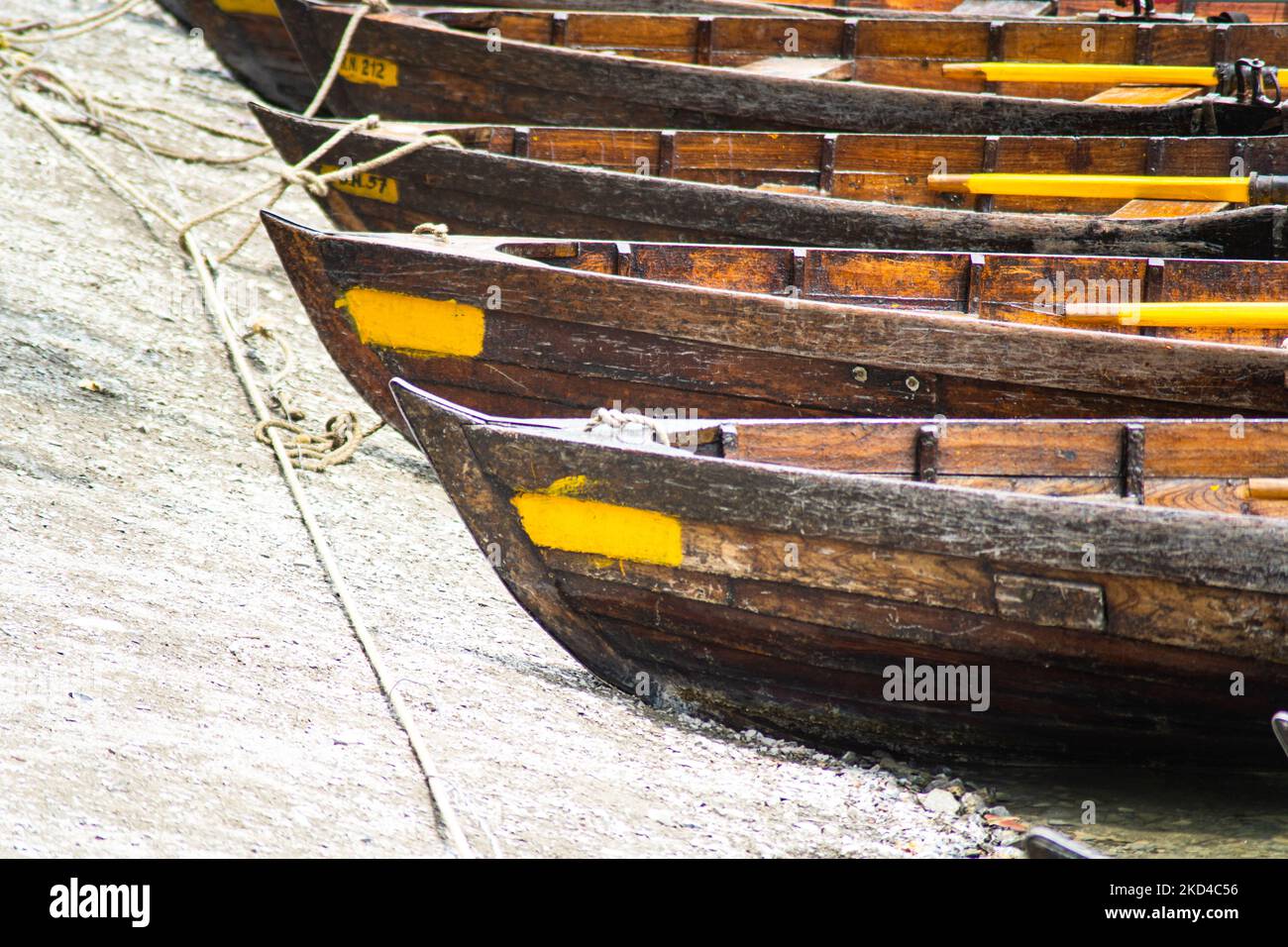 wooden-boats-tied-on-lake-edge-in-kashmir-bhimtal-naukuchiatal-on-the