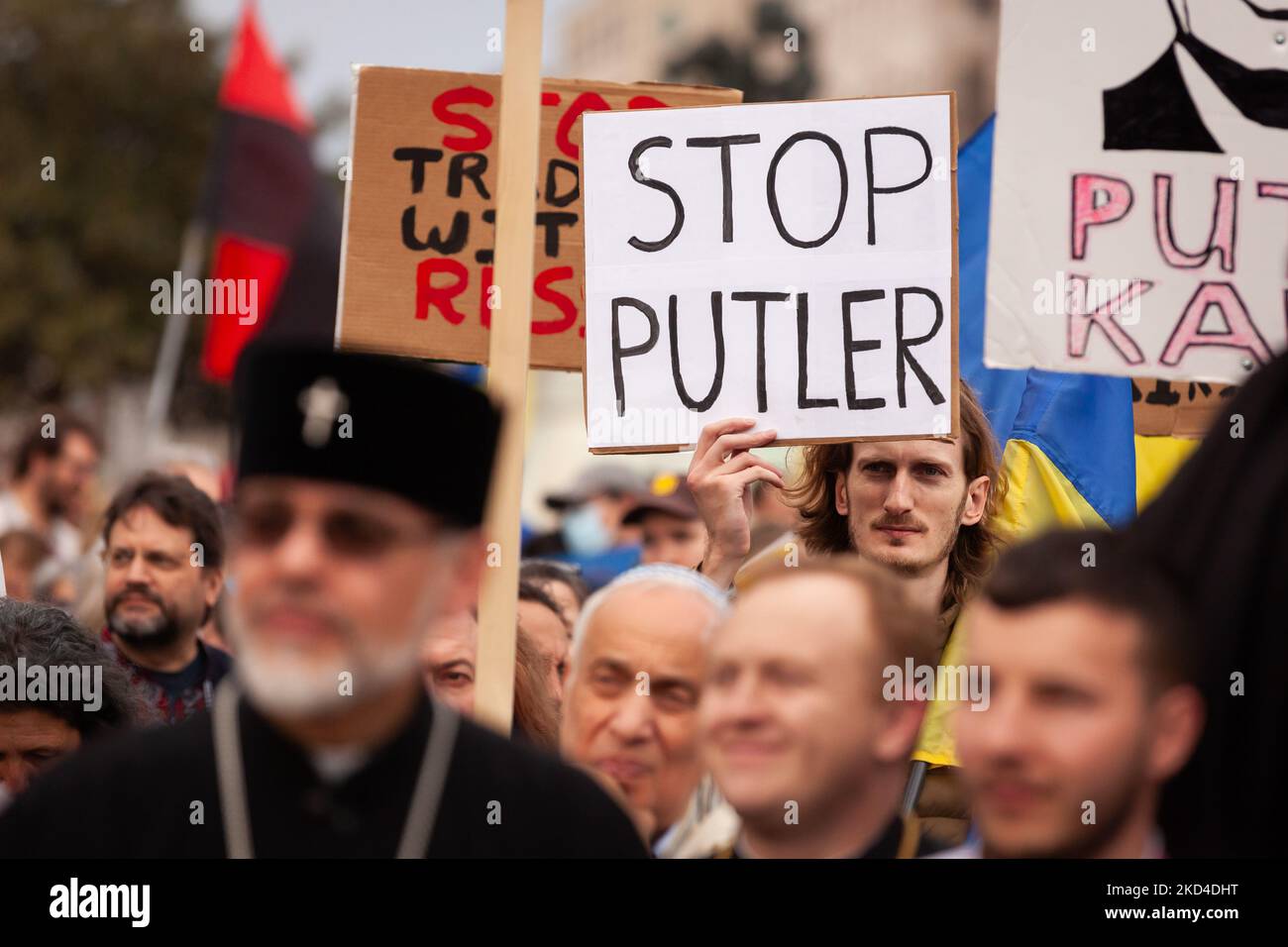 A protester holds a sign equating Russian President Vladimir Putin with Adlof Hitler during a rally for Ukraine at the White House. There have been many signs like this one, combining the names of Putin and Hitler, over the last 10 days of protests, Thousands of people from across the United States gathered to thank the US and other countries for their help, and to demand a no-fly zone and other assistance for Ukraine. The event was sponsored by United Help Ukraine and the Ukranian Congress Committee of America, both U.S.-based assistance and advocacy organizations. (Photo by Allison Bailey/Nu Stock Photo