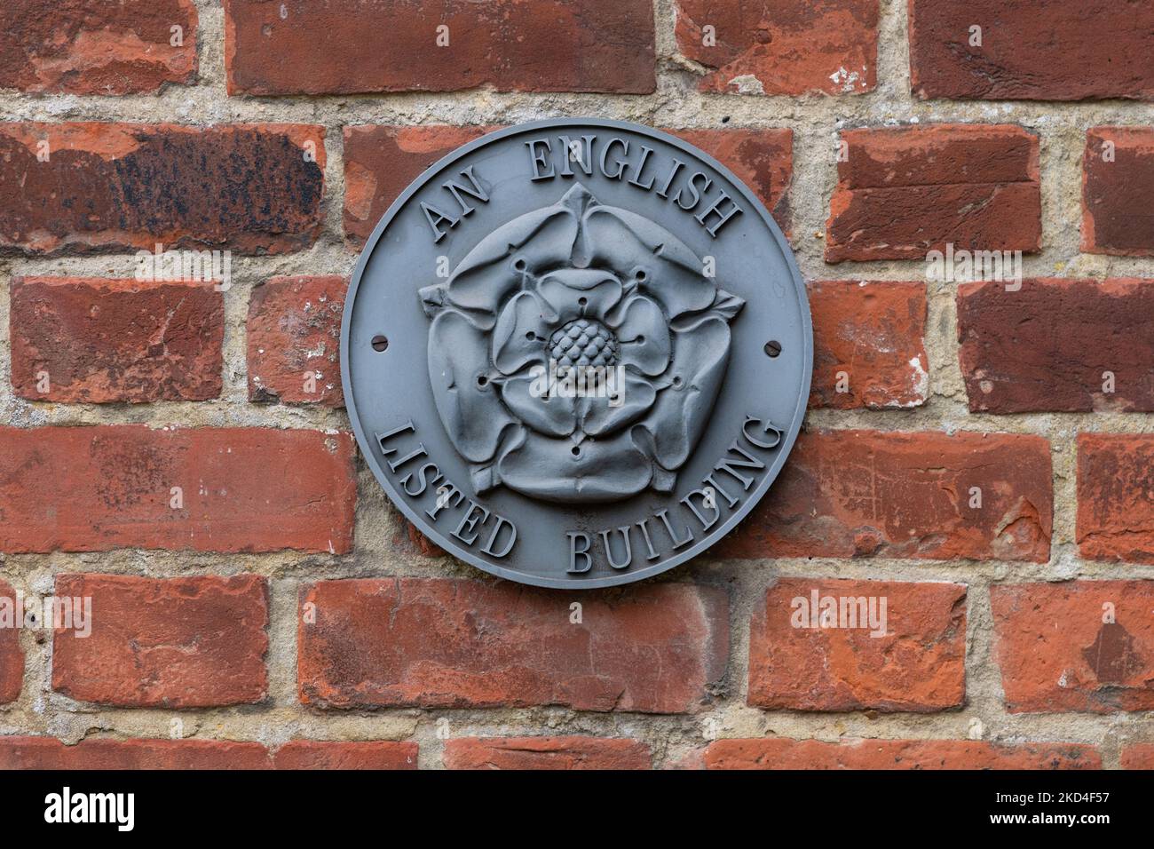 An English Listed Building plaque on listed building produced by The Listed Property Owners Club - England, UK Stock Photo