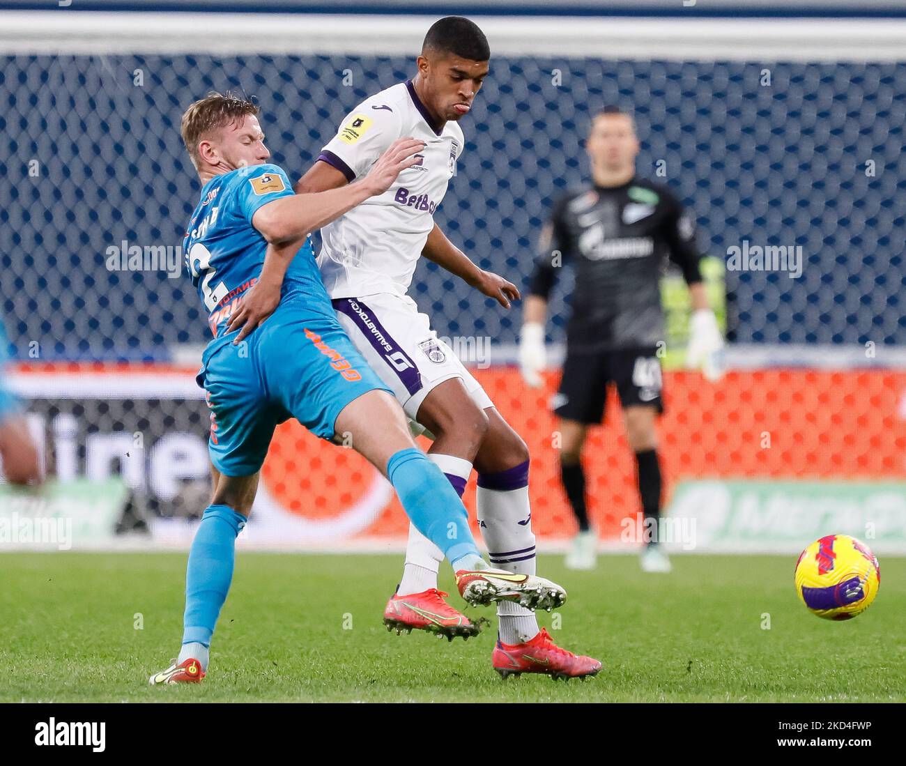 Dmitri Chistyakov (L) of Zenit St. Petersburg and Dilan Ortiz of Ufa vie for the ball during the Russian Premier League match between FC Zenit Saint Petersburg and FC Ufa on March 7, 2022 at Gazprom Arena in Saint Petersburg, Russia. (Photo by Mike Kireev/NurPhoto) Stock Photo