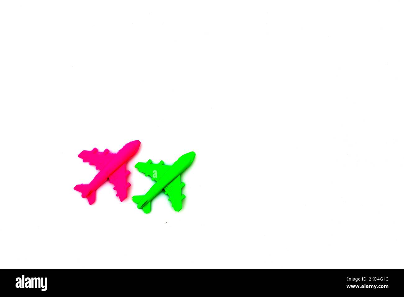 red and green airplane toy on white background Stock Photo - Alamy