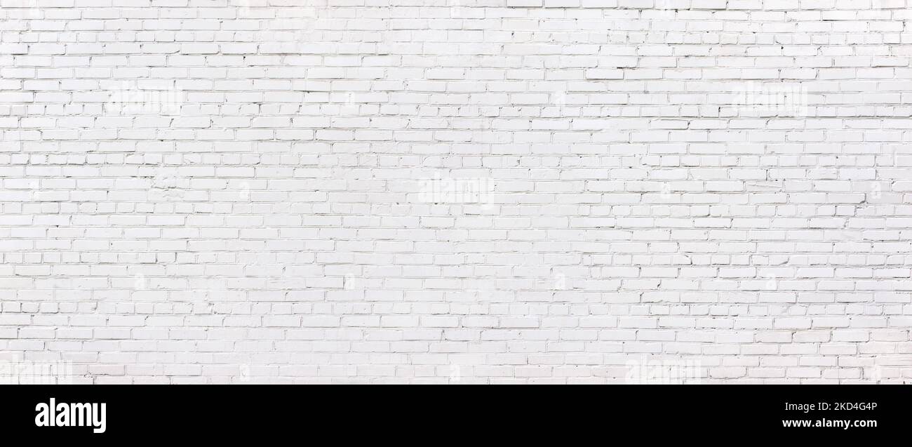 whitewashed brick wall, light brickwork background for design. White