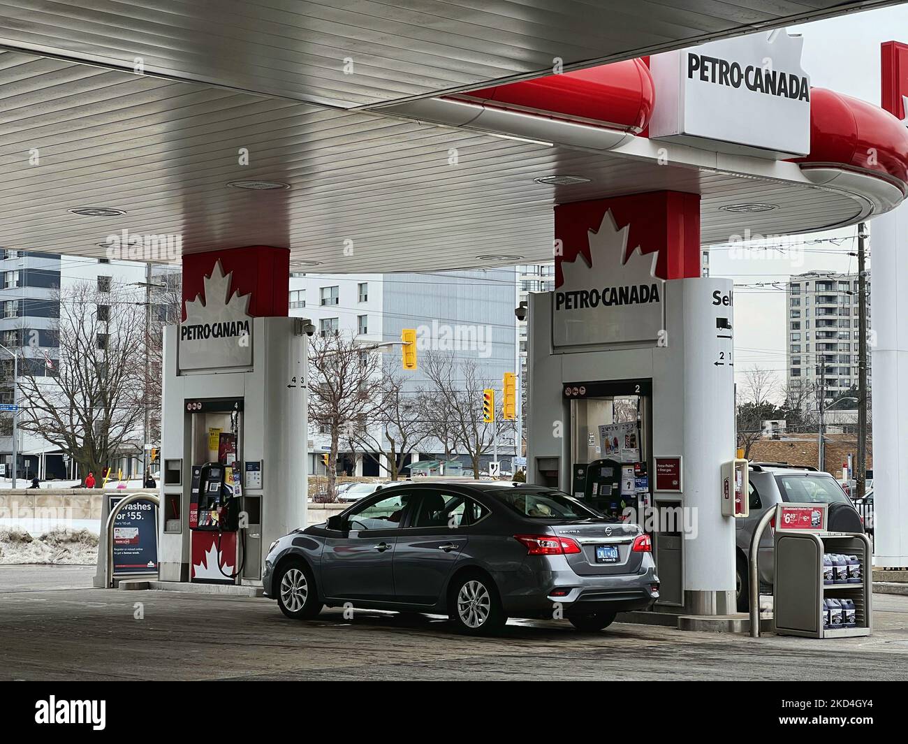 Motorists fill-up their vehicles at a Petro-Canada gasoline station in Toronto, Ontario, Canada, on march 05, 2022. Gas prices in the Greater Toronto Area have went up a staggering 25 cents per litre over the last week. However many are warning that this may be the 'calm before the storm' amid ongoing geopolitical tensions in Eastern Europe due to the war between Ukraine and Russia. It is expected that the price of oil will approach US $150 a barrel within weeks, causing the cost of gasoline to surpass $2 a litre. (Photo by Creative Touch Imaging Ltd./NurPhoto) Stock Photo