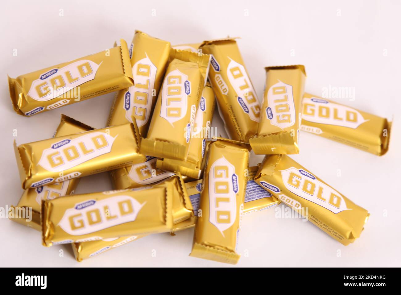 Stack of McVities Gold Bars in rough pile multiple golden chocolate