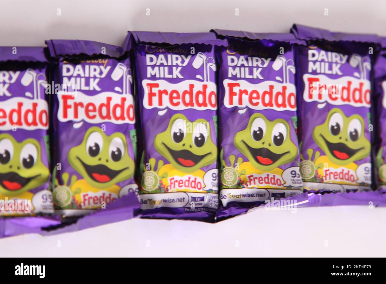 Cadbury Dairy Milk Freddo chocolate bars on white background, bar of chocolate Freddos Stock Photo