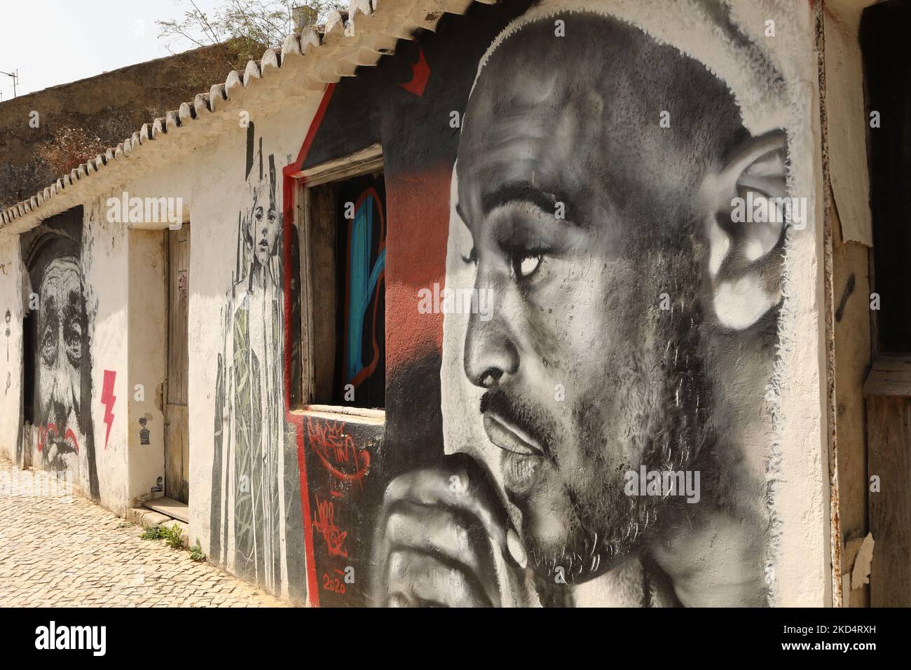 Street Art. A mural of an African man in old town Lagos, Algarve, Portugal Stock Photo