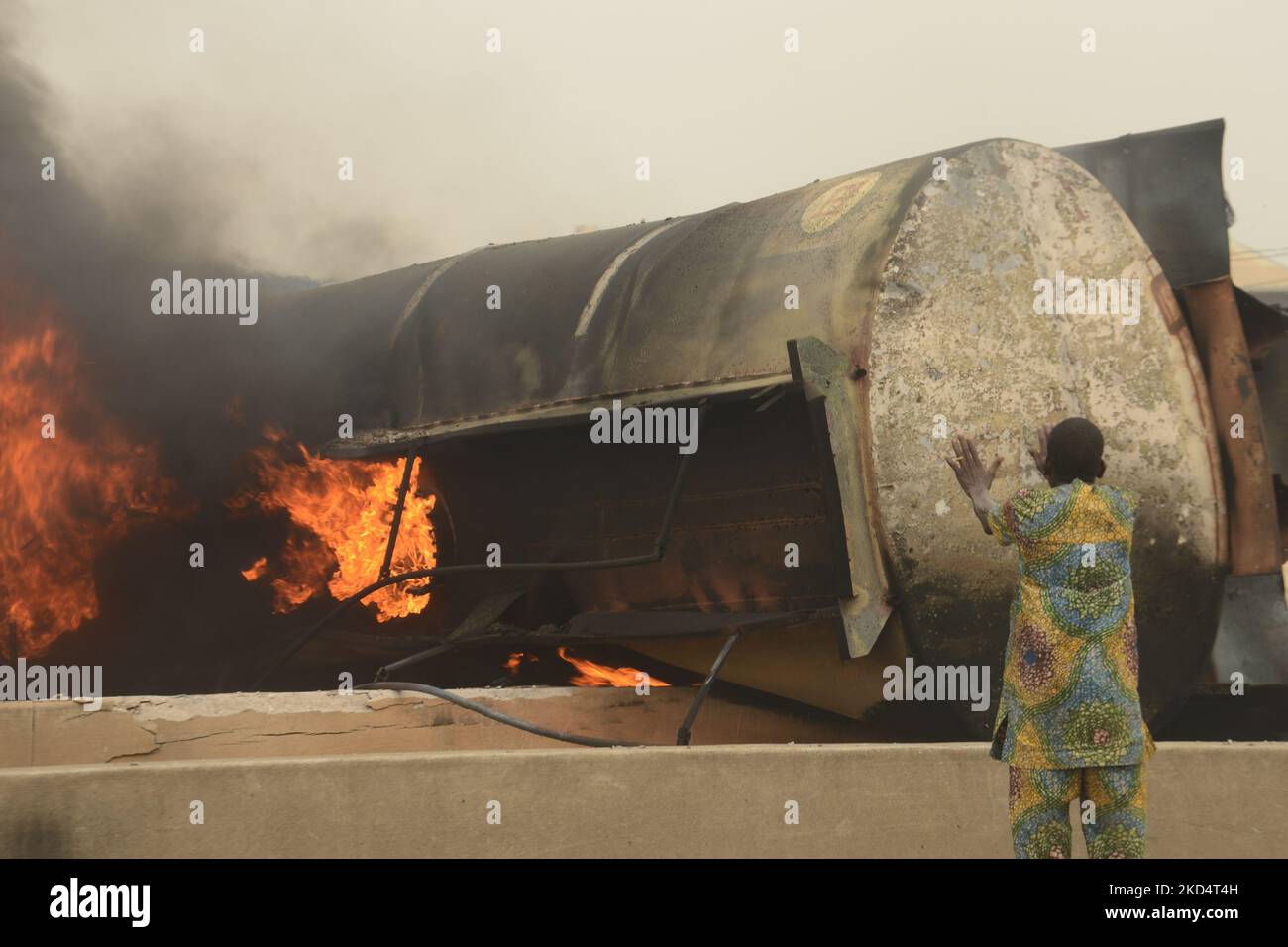 Local residents watch as tanker laden with diesel goes up in flames ...