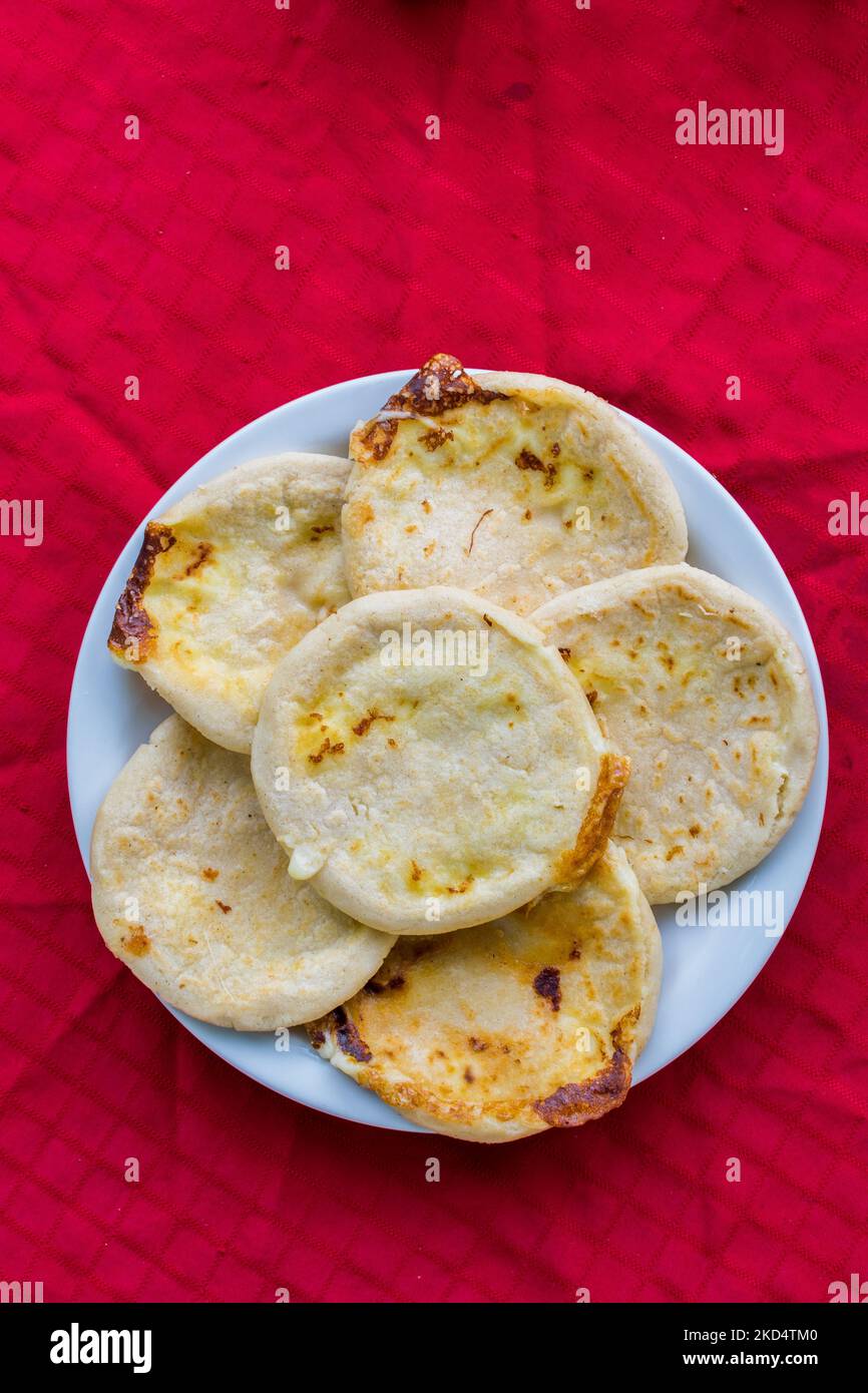 typical Salvadoran dish, cheese pupusas with cabbage and tomato sauce. rice and corn pupusas