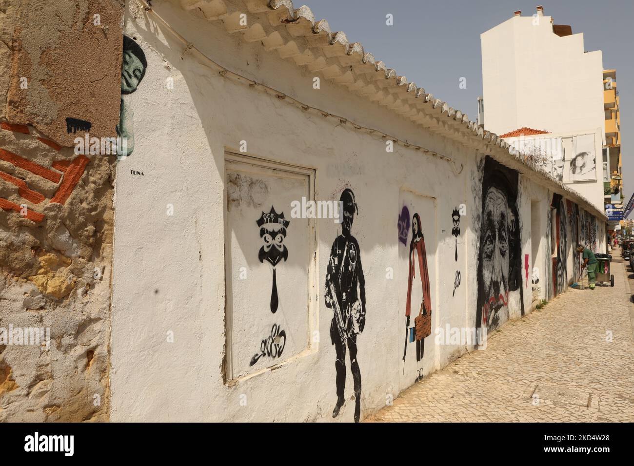 Street Art. A series of murals on a row of buildings in old town Lagos, Algarve, Portugal Stock Photo