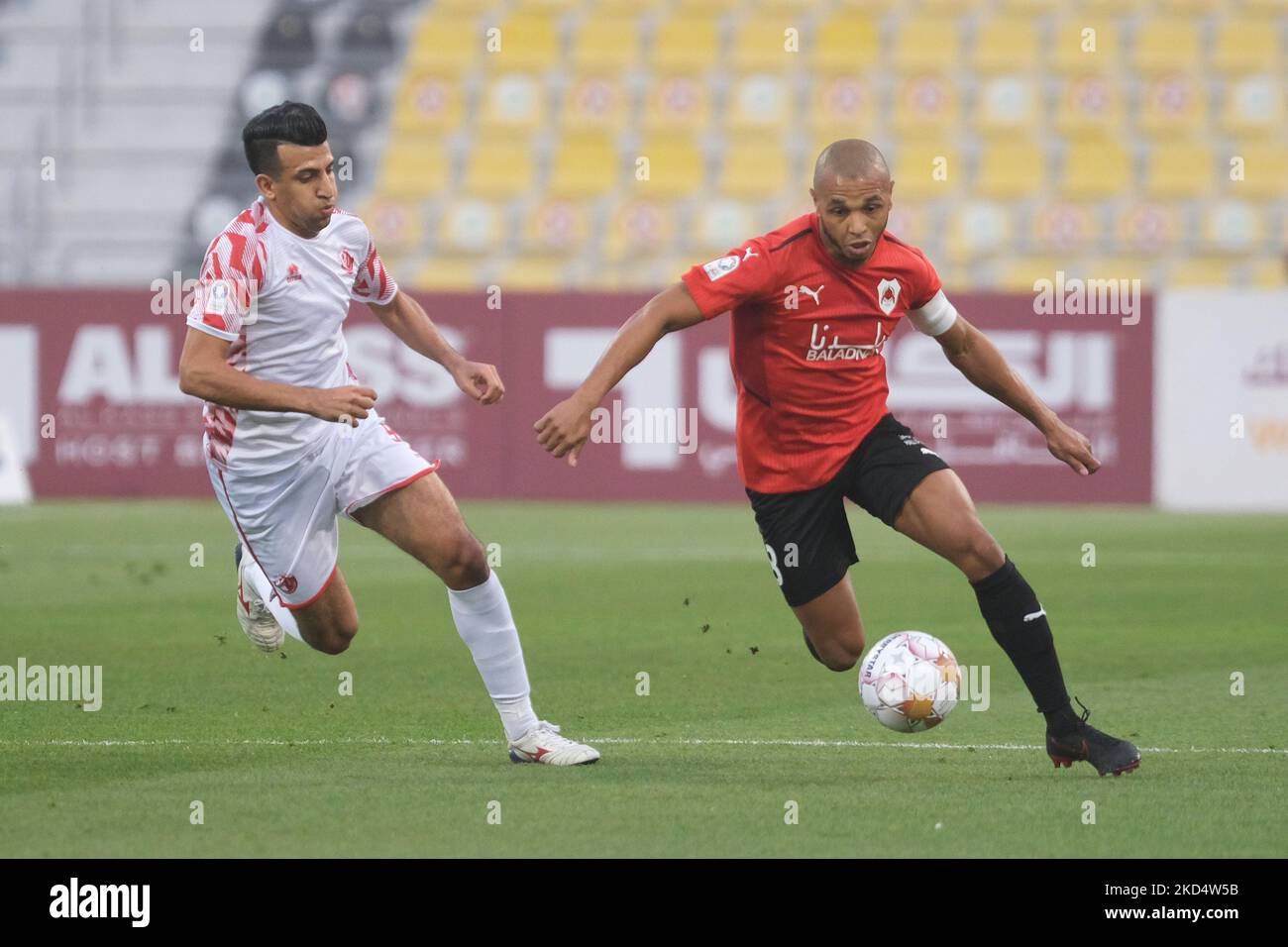 Mohamed El-Sayed (34) of Al Shamal evades a tackle during the QNB Stars  League game between Al Rayyan and Al Shamal at the Suheim bin Hamad Stadium  in Doha, Qatar on 11