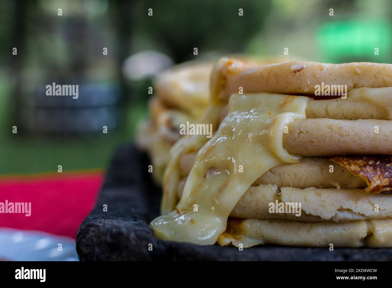 typical Salvadoran dish, cheese pupusas with cabbage and tomato sauce