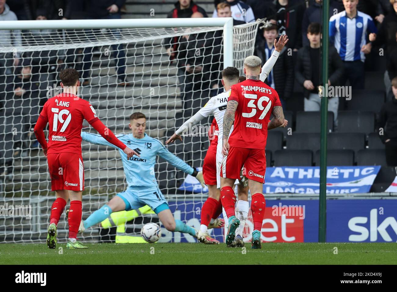 Tom Naylor scores for Wigan Athletic, to take the lead to make it 1 - 0 against Milton Keynes Dons, during the Sky Bet League 1 match between MK Dons and Wigan Athletic at Stadium MK, Milton Keynes on Saturday 12th March 2022. (Photo by John Cripps/MI News/NurPhoto) Stock Photo
