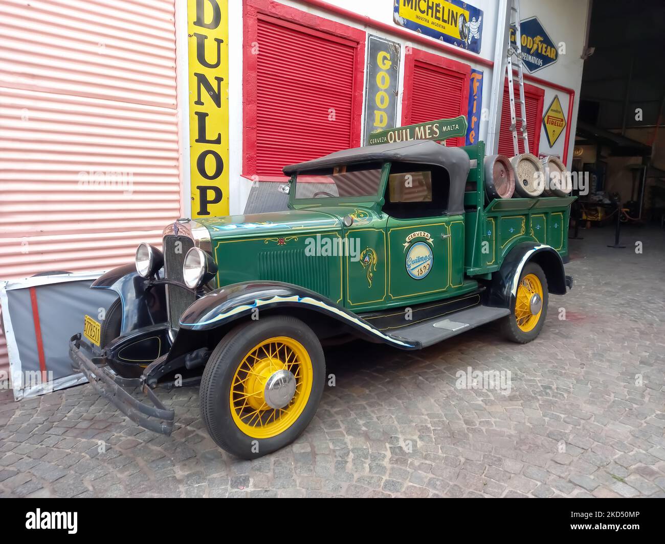 Antique vintage old 1930 Chevrolet Chevy series AD beer barrel delivery pickup truck with fileteado artwork on cobblestone street. Automobile Museum Stock Photo