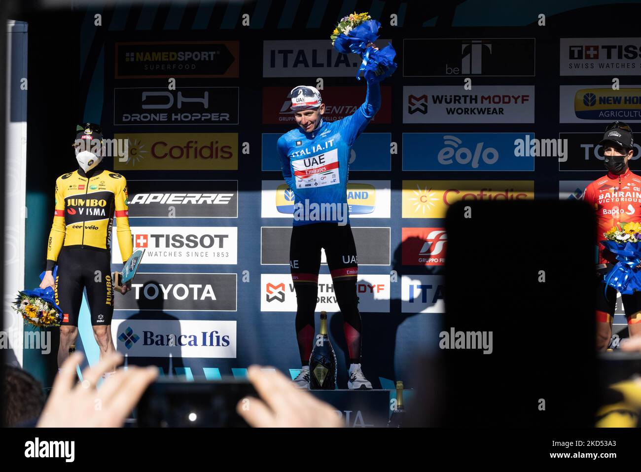 (L-R) Jonas Vingegaard Rasmussen of Denmark and Team Jumbo - Visma on second place, race winner Tadej Pogacar of Slovenia and UAE Team Emirates Blue Leader Jersey and Mikel Landa Meana of Spain and Team Bahrain Victorious on third place pose on the podium ceremony after the 57th Tirreno-Adriatico 2022 - Stage 7 a 159km stage from San Benedetto del Tronto to San Benedetto del Tronto on March 13, 2022 . (Photo by Cinzia Camela/LiveMedia/NurPhoto) Stock Photo