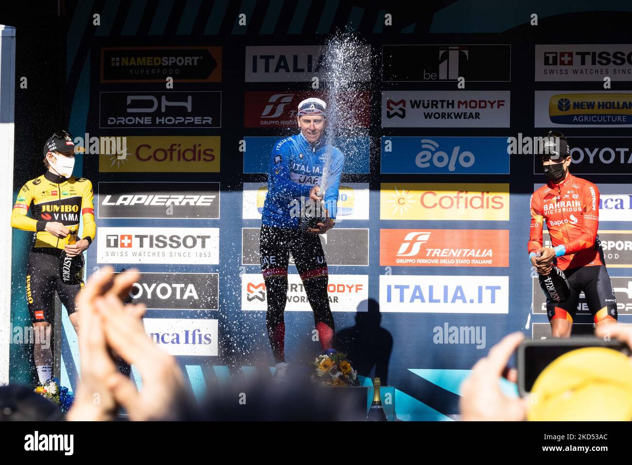 (L-R) Jonas Vingegaard Rasmussen of Denmark and Team Jumbo - Visma on second place, race winner Tadej Pogacar of Slovenia and UAE Team Emirates Blue Leader Jersey and Mikel Landa Meana of Spain and Team Bahrain Victorious on third place pose on the podium ceremony after the 57th Tirreno-Adriatico 2022 - Stage 7 a 159km stage from San Benedetto del Tronto to San Benedetto del Tronto on March 13, 2022 . (Photo by Cinzia Camela/LiveMedia/NurPhoto) Stock Photo