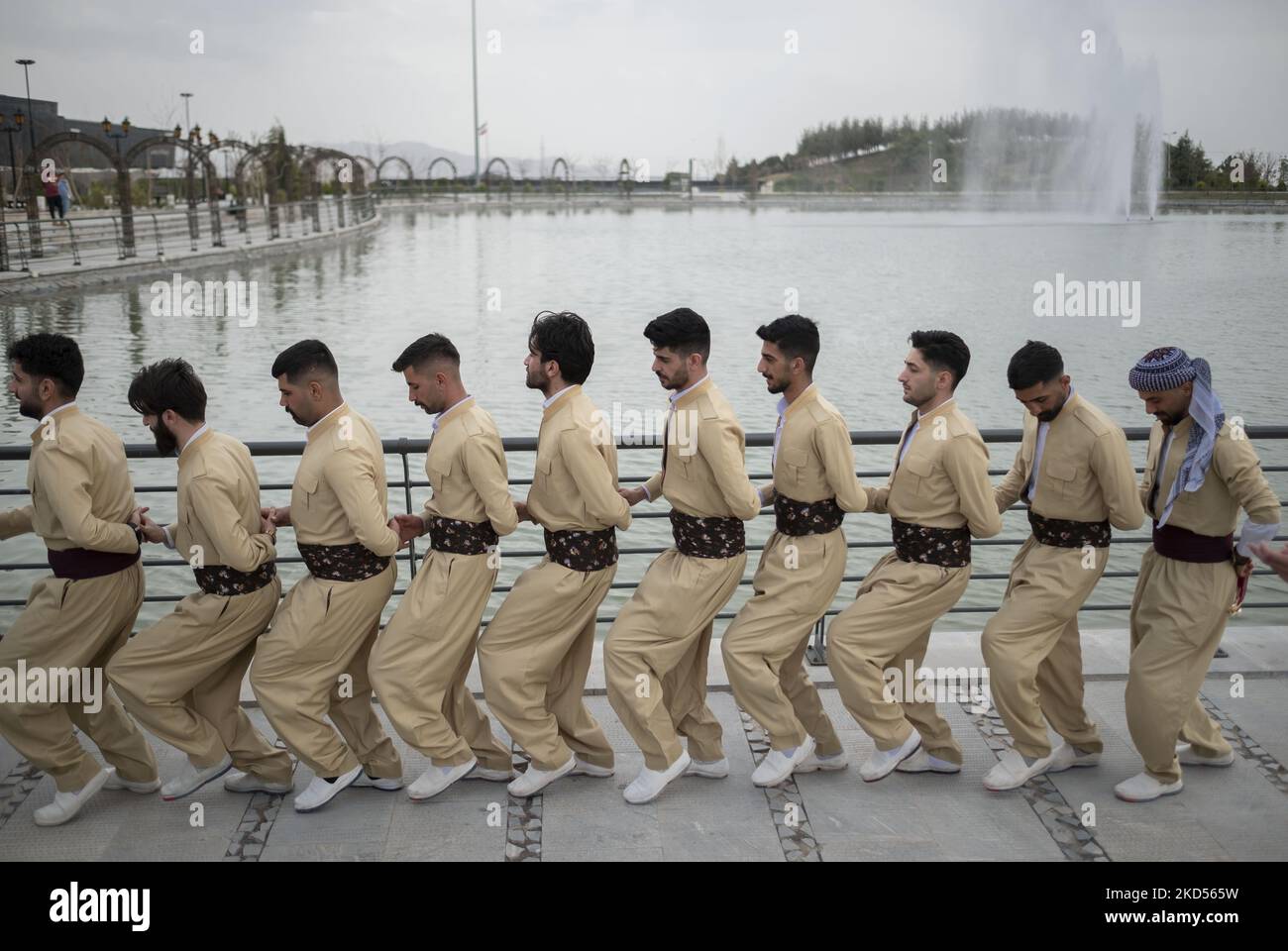 A group of Iranian-Kurds dance in a ceremony to mark Nowruz in the Art ...