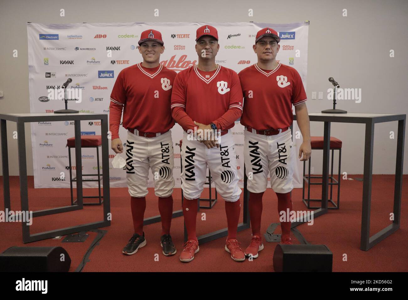 From left to right, Jesús Fabela, Juan Gabriel Castro, and Arturo López, members of the Diablos Rojos del México team, pose for the camera during a press conference at the Alfredo Harp Helú Stadium in Mexico City for training and the start of the 2022 preseason. On this first day of practice, there were 20 outfielders and 25 pitchers, and the team is awaiting the report of the cannonballers Japhet Amador and the American reinforcement, Justin Bour. (Photo by Gerardo Vieyra/NurPhoto) Stock Photo