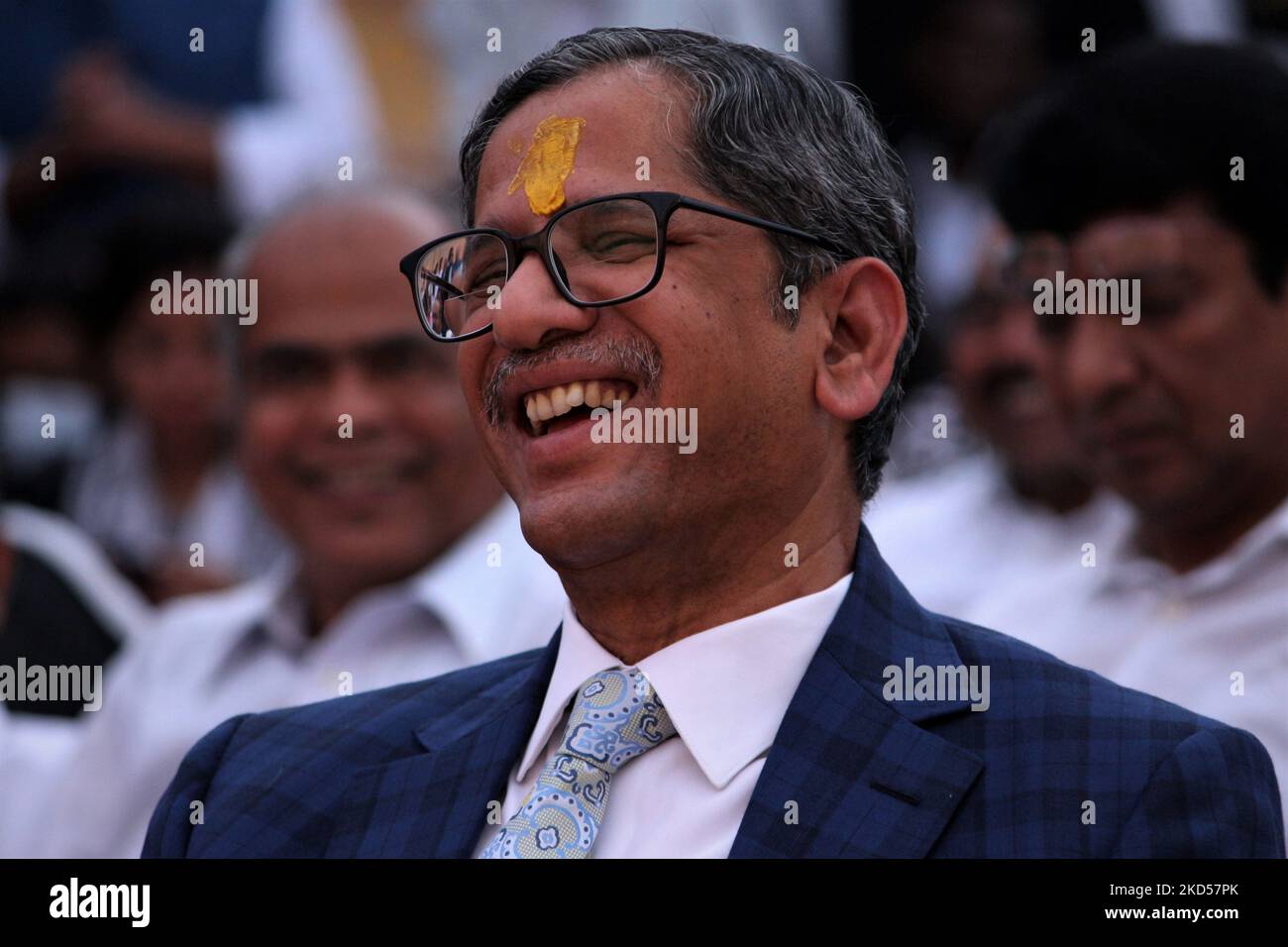 Chief Justice of India N. V. Ramana laughs during an event organised by Supreme Court Bar Association for celebration of Holi in New Delhi, India on March 15, 2022. (Photo by Mayank Makhija/NurPhoto) Stock Photo