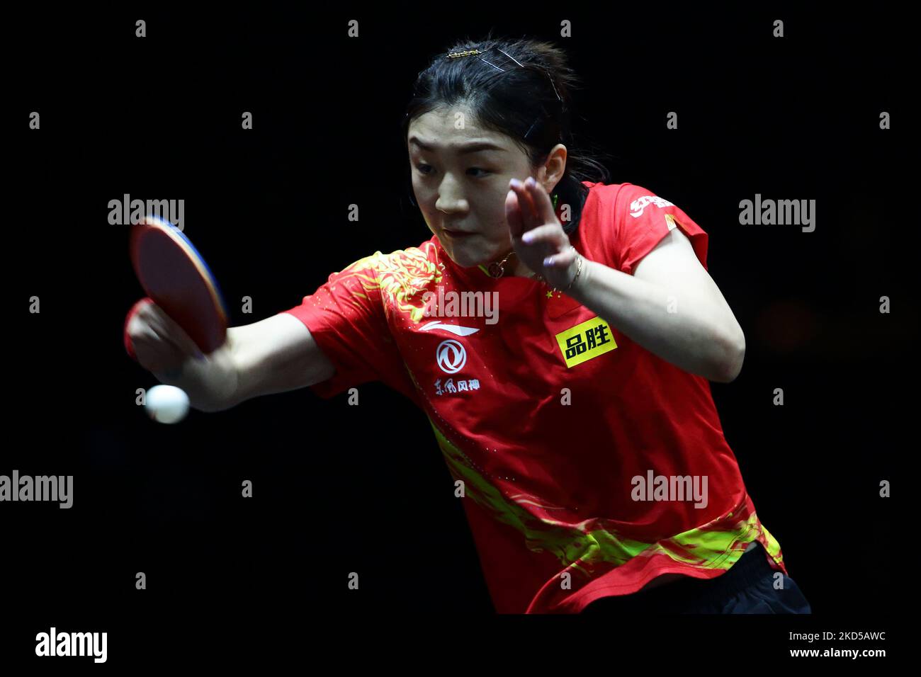 Chen Meng of China plays a shot against Kasumi Ishikawa of Japan during the Women's Singles Quarterfinals match of Singapore Smash 2022 at OCBC Arena on March 17, 2022 in Singapore. (Photo by Suhaimi Abdullah/NurPhoto) Stock Photo