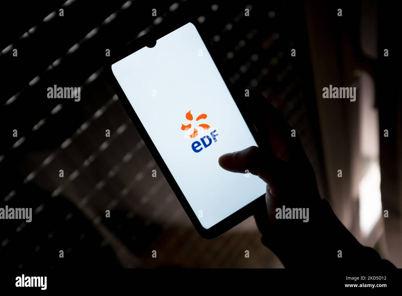In this photo illustration an Electricite de France logo seen displayed on a smartphone screen in Athens, Greece on March 18, 2022. (Photo by Nikolas Kokovlis/NurPhoto) Stock Photo
