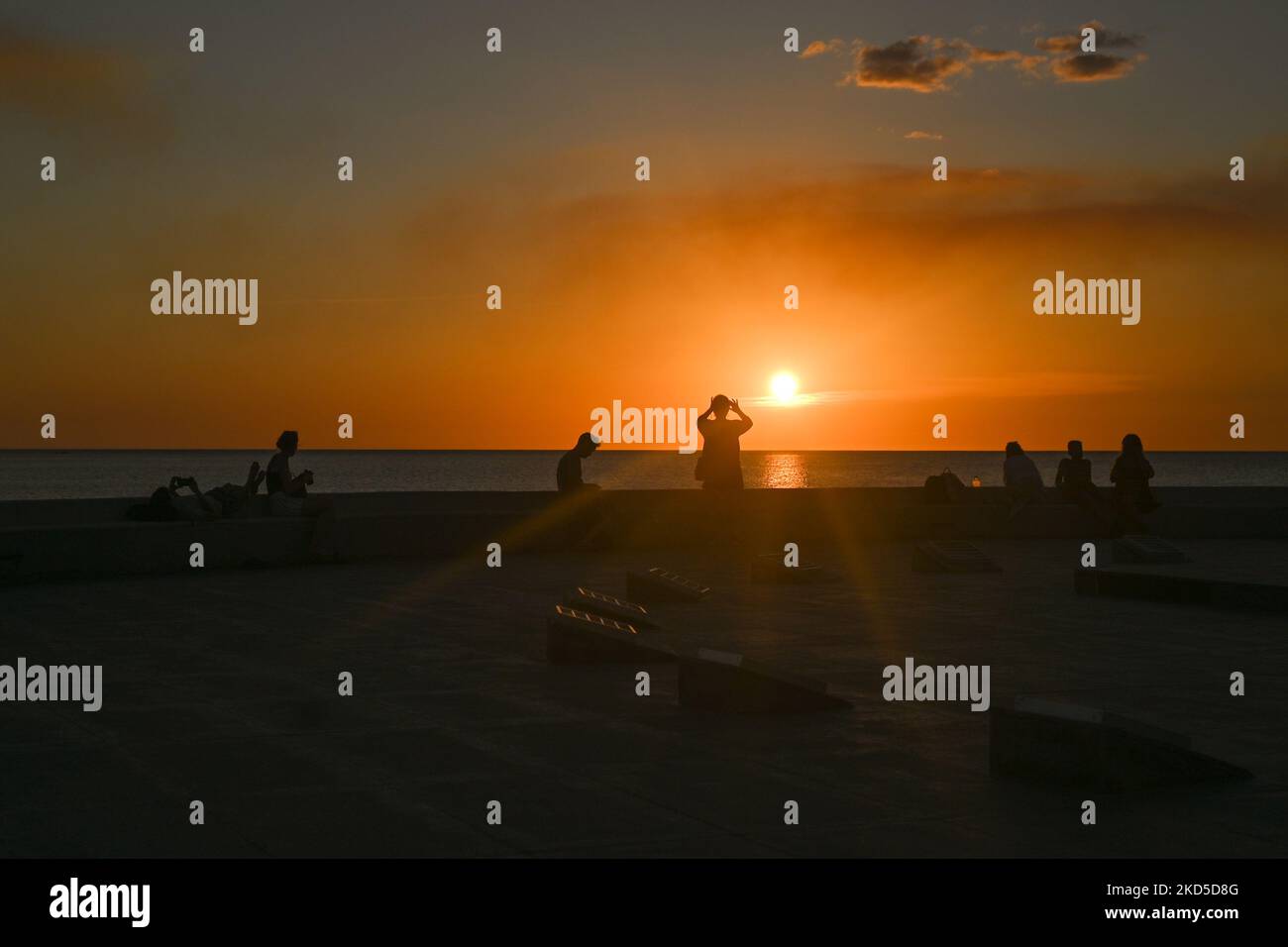 View of a sunset along the coast in San Francisco de Campeche. On