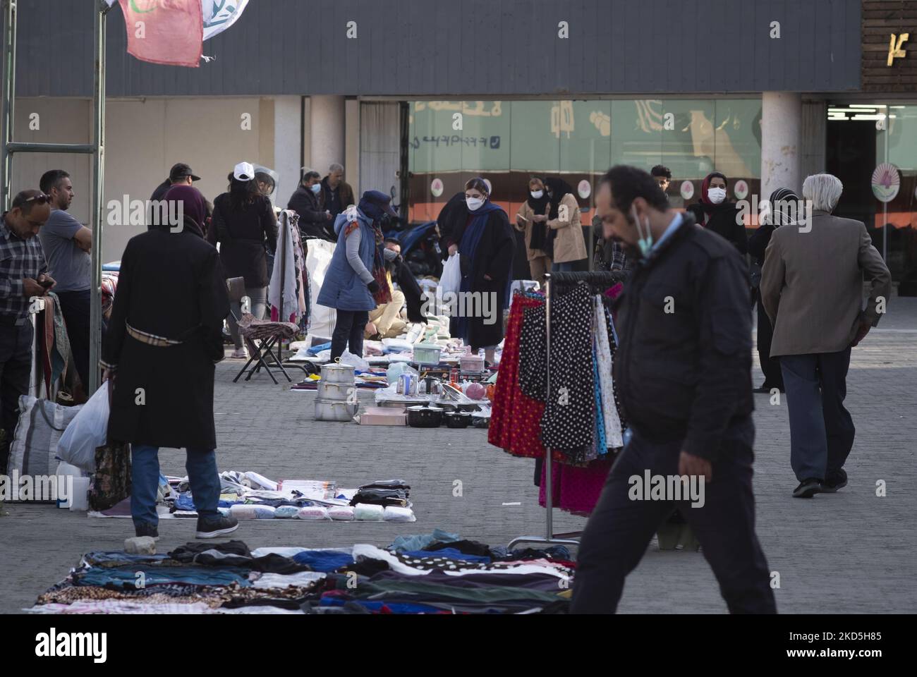Iranian people shop from vendors in a shopping area in the Ekbatan