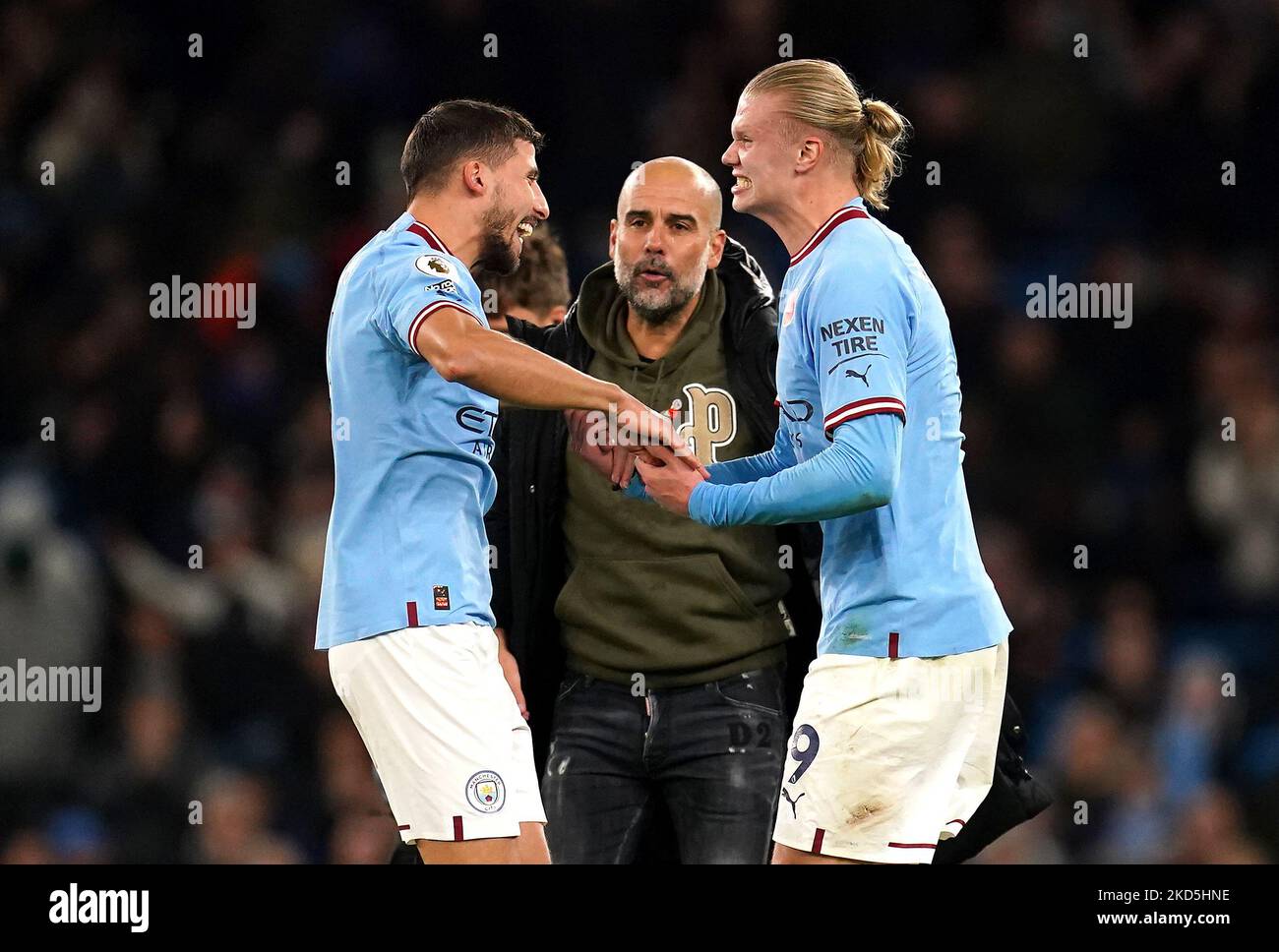 Manchester City's Erling Haaland (right) Celebrates With Team-mate ...