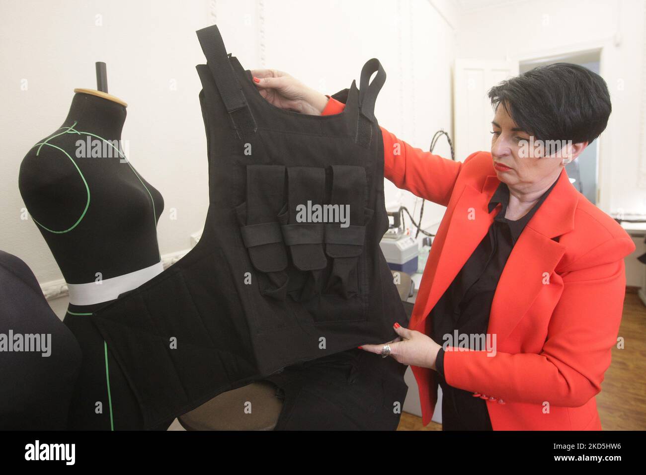 A woman works on bulletproof vests for servicemen of Ukrainian army in a  tailoring studio of well-known Ukrainian fashion designer Uzun Vital in  Odesa, Ukraine 20 March 2022. After beginig the Russian