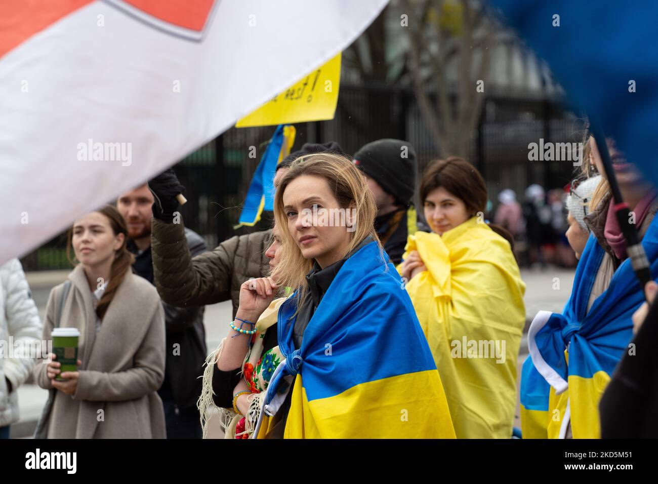 Demonstrators gather in front of the White House on March 20, 2022 to protest against the Russian military invasion of Ukraine and to ask the Biden administration for tougher sanctions and increased military aid to Ukraine (Photo by Bryan Olin Dozier/NurPhoto) Stock Photo