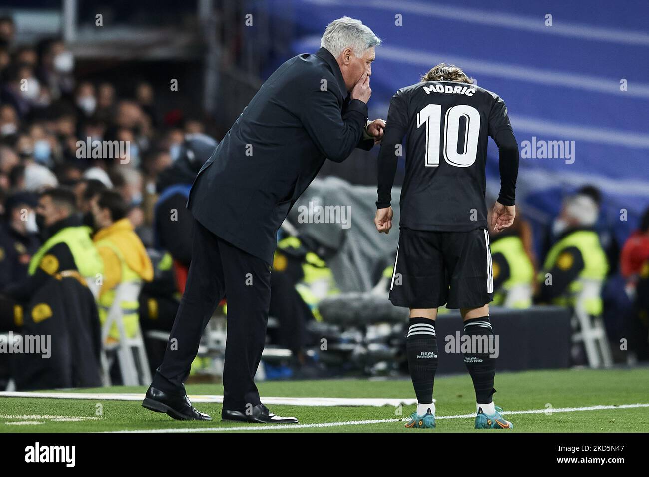 Carlo Ancelotti head coach of Real Madrid gives instructions to Luka ...